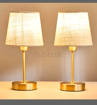 Pair of modern brass bedside table lamps with fabric shades