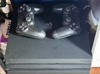 Sony PlayStation 4 Pro 1TB Console with 2 DualShock 4 Controllers