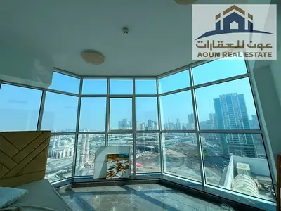 Two-bedroom apartment with a living room in Al Majaz 2, second owner, balcony and cabinets, super deluxe finish, gym and pool and free parking, 55,000