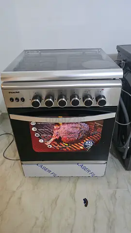 Used freestanding stainless steel gas cooker with oven - good condition