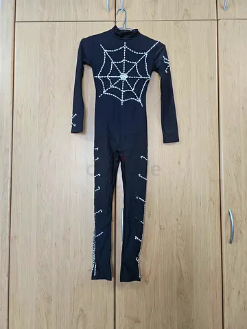 Black unitard with spider web
