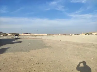 Four plots of land for sale next to each other, including two corner plots in Ajman, Masfoot 8