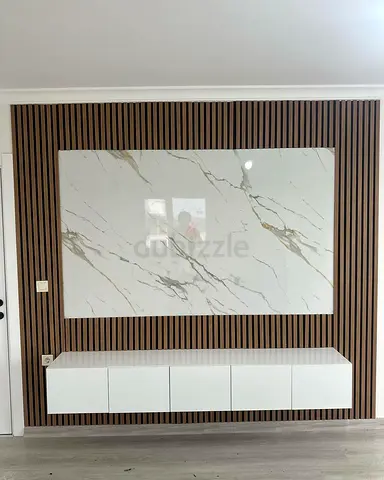 Wall-mounted TV panel with floating white media cabinet