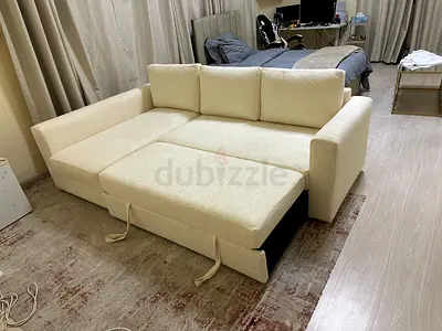 Cream L-Shaped Sofa Bed with Pull-Out Extension