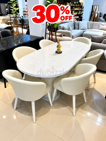 White Marble-Top Dining Table with 6 Cream Upholstered Chairs