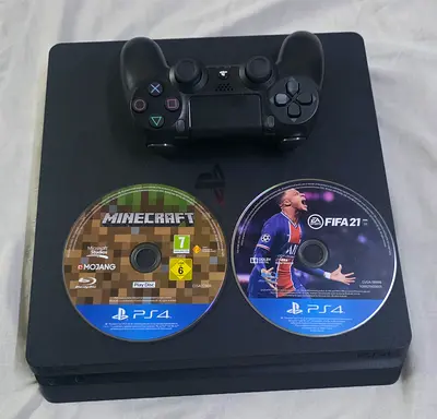 PS4 SLIM 500GB 1 CONTROLLER 2 GAMES