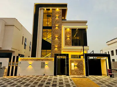 Modern villa for sale in Al Yasmeen, Ajman | 5 master bedrooms | 3 floors | Luxury stone façade | F