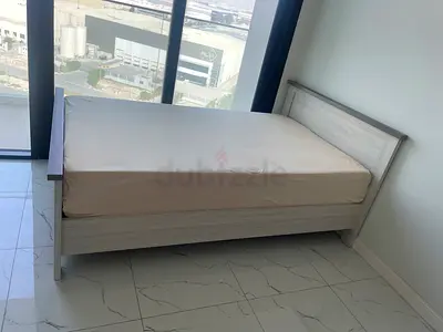 Wooden bed frame with slatted headboard and mattress (excellent condition), dresser, washing machine