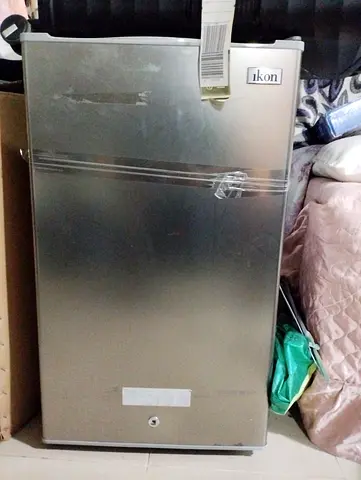 Chair and small fridge
