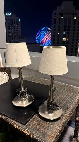 Pair of metal bedside/table lamps with cream fabric shades