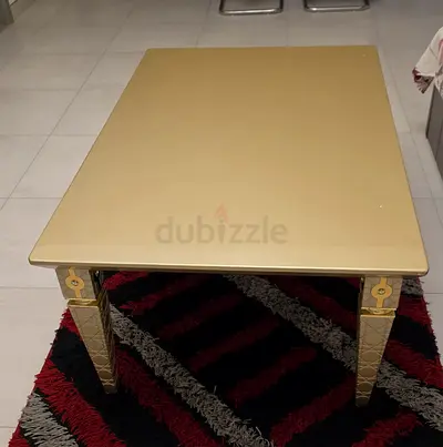 Modern Gold Coffee Table with Patterned Legs