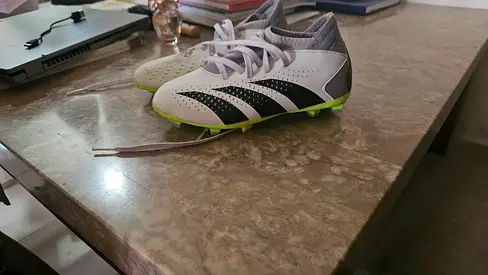 Used pair of boys football (soccer) cleats, size approx. 5- 6 years US 1 size