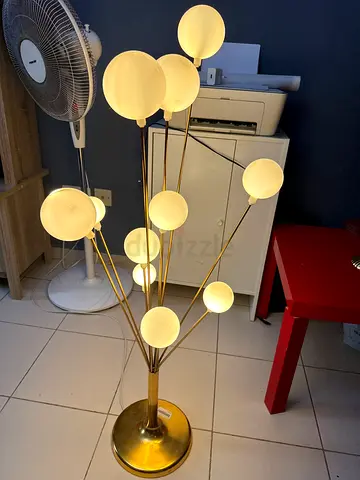 Brass multi-globe floor lamp with frosted glass shades