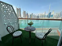 Furnished Studio | Canal & Burj Khalifa Facing | Business Bay Experience modern urban living in this