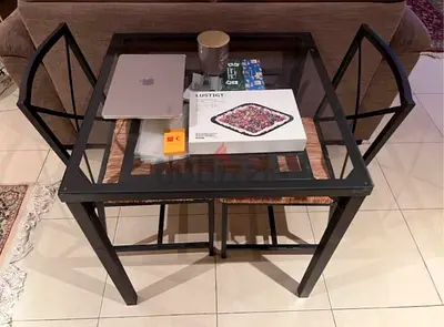 Glass top square dining table with metal frame - 2 chairs included