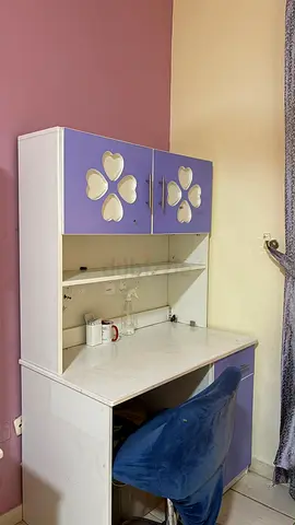 Kids study desks with storage hutch and bed for two children with a side table in good condition