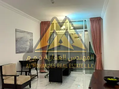 شقة مفروشة غرفتين وصالة للإيجار السنوي | أبراج الواحة، الراشدية 1، عجمان | مساحة كبيرة جداً | بلكونة إطلالة مفتوحة | باركنج مجاني | 52,000 درهم على 4