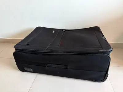 Black soft-shell large suitcase - used