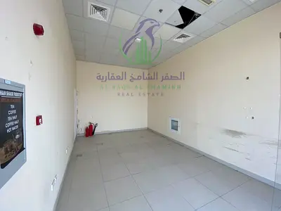 Commercial shop available for rent in Al Majaz 3 on Al Khalidiyah Street, Sharjah, with a total area of 256 sq. ft.