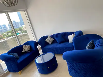 Blue velvet 3-piece sofa set with round coffee table - excellent condition