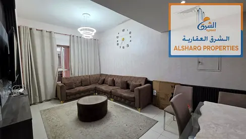 Fully furnished 2-bedroom apartment with a living room, ready for immediate occupancy. Features a balcony with a distinctive view and a private parkin