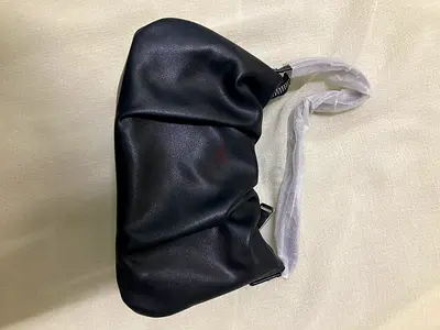 Black ruched leatherette clutch bag with zipper — small evening pouch