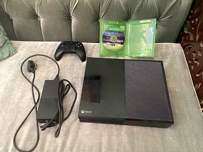 Xbox One console with controller, power brick and 1 game - good working condition