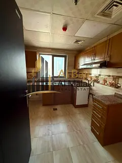 An apartment consisting of two master rooms, 3 bathrooms, and a balcony in Al Majaz 3 with an open v