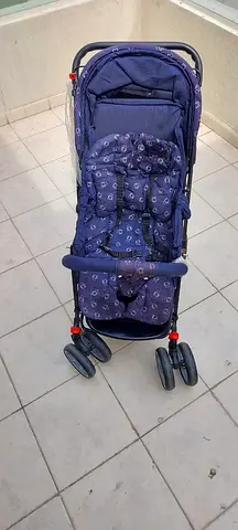 Lightweight navy baby stroller in good used condition