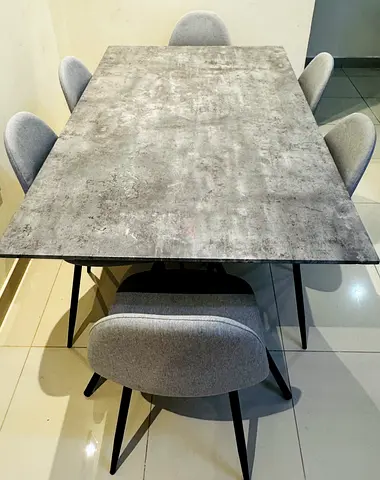 6-seater modern dining table with grey fabric chairs