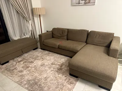 L-shaped fabric sectional sofa in beige - good condition