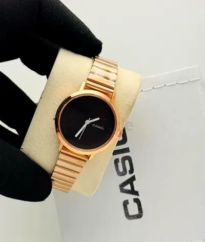 Casio women's rose gold bracelet watch with black dial - Brand new