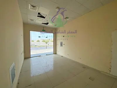 Shop for Annual Rent in Al Khalidiyah – Al Majaz Three | 256 Sq Ft | Main Road | Suitable for All Activities | Four Payments