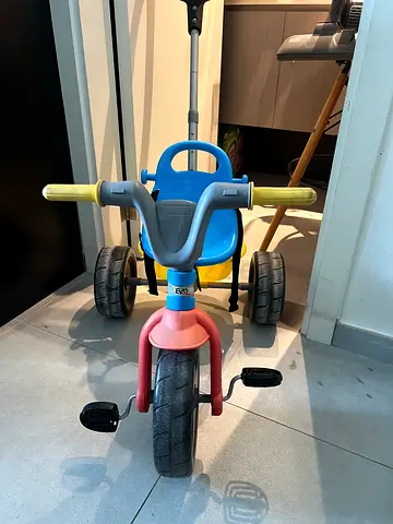 Used toddler tricycle with push handle — good condition