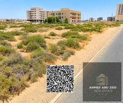 Residential and commercial land (G+10) in a prime location on Qar Street; freehold
