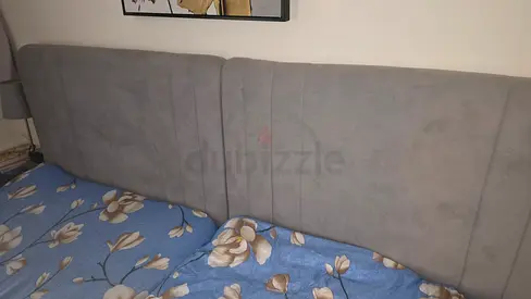Grey upholstered singal bed in good condition