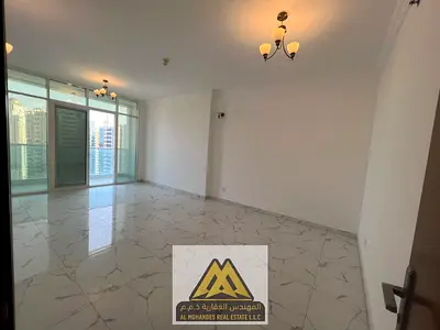 2BR in Al Waha Towers, Al Rashidiya 1, free parking, gym and pool, AED 51,009 yearly, 4 payments.