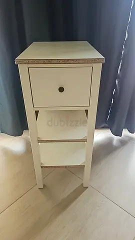 Small white bedside table with drawer and shelves — good condition from IKEA