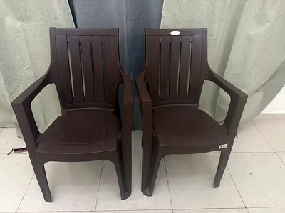 Set of 2 dark brown plastic patio chairs - sturdy stackable outdoor seating