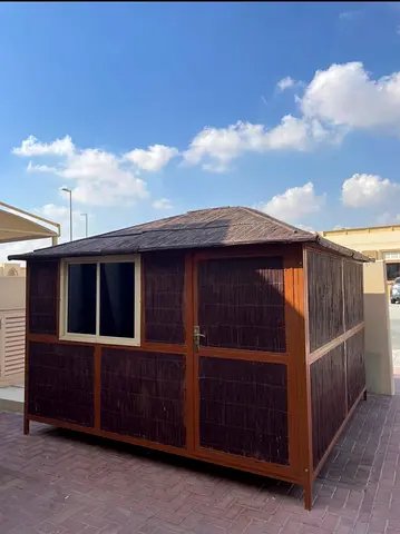 Outdoor Wooden Garden Shed with Thatch Design