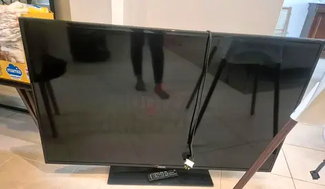 55-inch LED TV in working condition with remote (stand included)