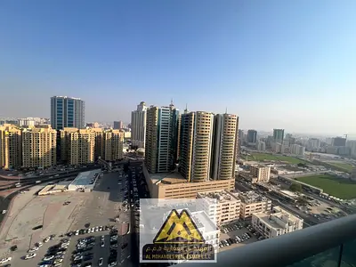 **شقة غرفتين وصالة للإيجار السنوي – أبراج الواحة، الراشدية 1 – عجمان**