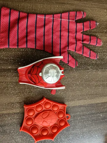 Spider-Man themed kids gloves with web pop bubble toy and wrist spinner