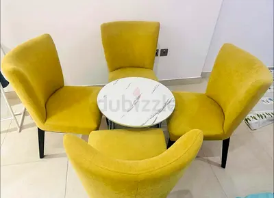 Set of 4 Yellow Upholstered Accent Chairs with - selling for AED 150 . Fine ifyou want two or three