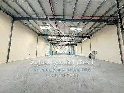 مستودع 9,000 قدم بالصجعة | 40 كيلوواط | ارتفاع عالي | شارع رئيسي تسهيلات في السداد