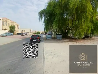 Two plots of residential land for villas; the second plot is on Sheikh Ammar Street, on a paved road; freehold