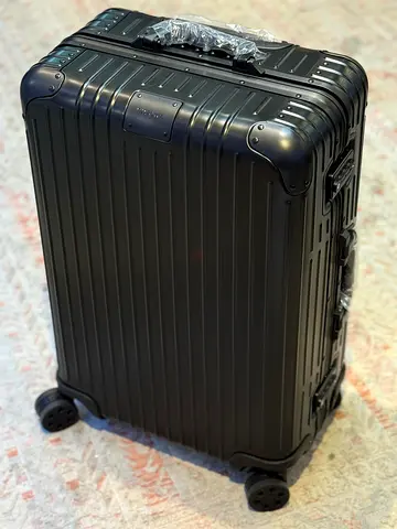 Rimowa small silver hardshell carry on case