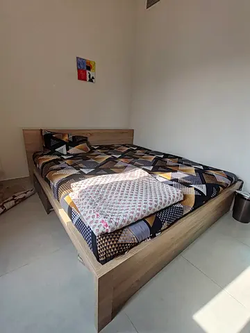 Wooden double bed frame with headboard - almost new