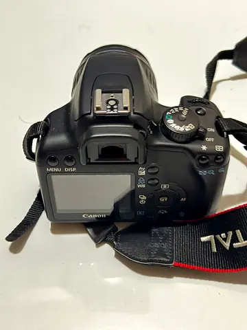 Canon EOS 1000D with lens EF s-18-55mm