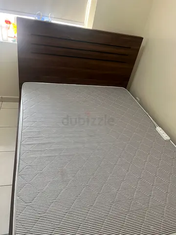 Queen bed with mattress in good condition